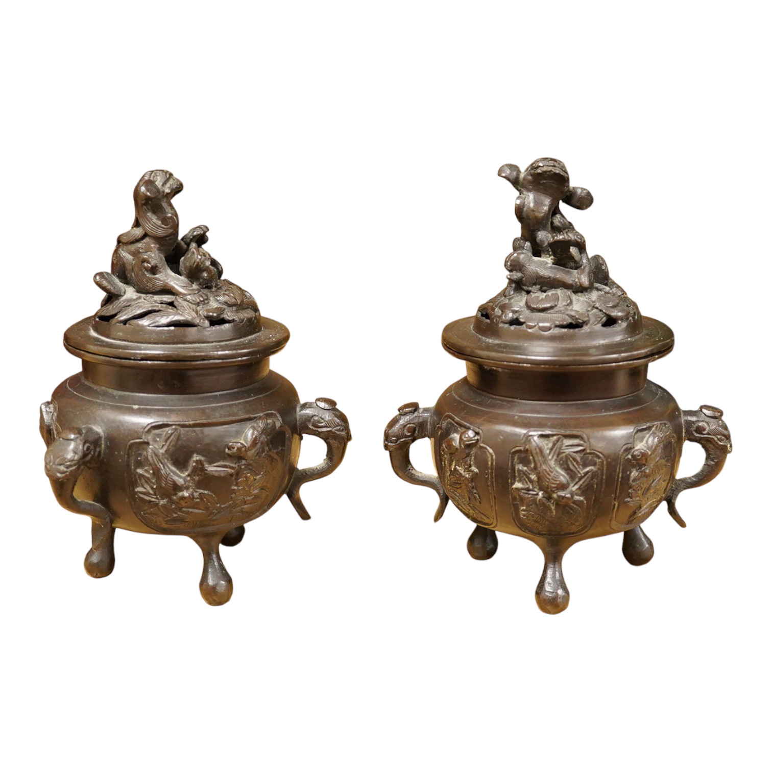 A pair of Japanese bronze koros raised on tripod feet, 19th century, 14cm high